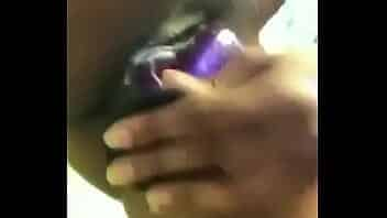 girl please her self with purple dildo in bathroom video