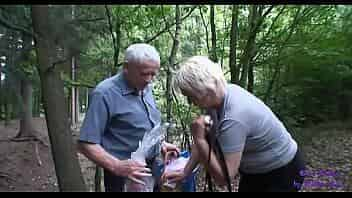 The young girl meets an elderly married couple fucking in the woods video