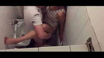 Hidden Cam shows a horny couple having a hot sex quickie in a public toilet video